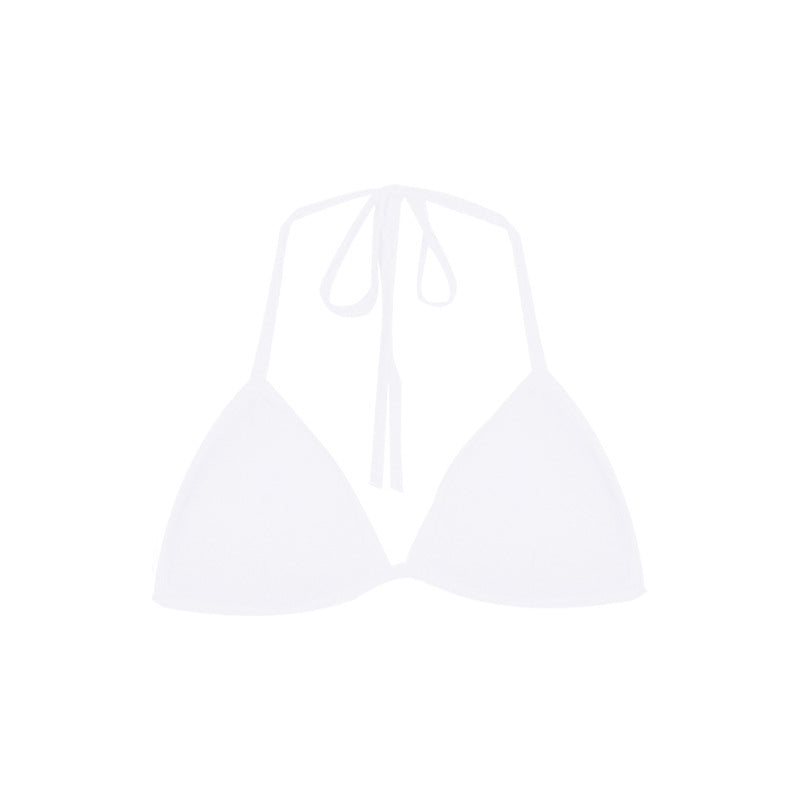 White bikini top on a light gray background