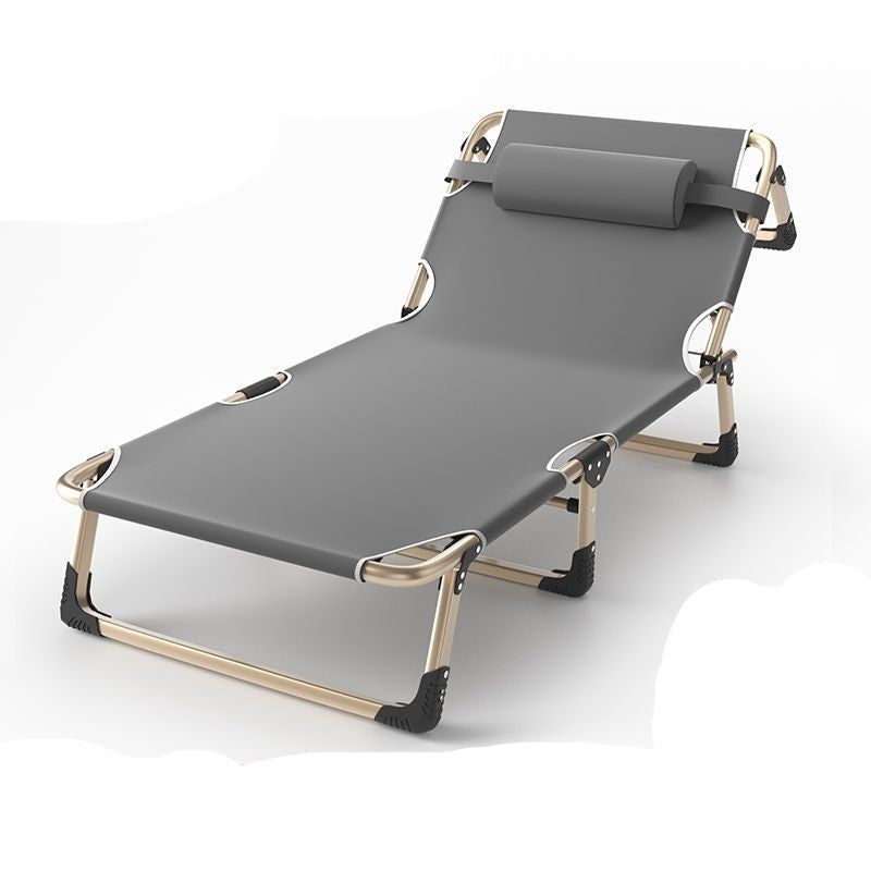 Gray folding lounge chair with headrest on a white background