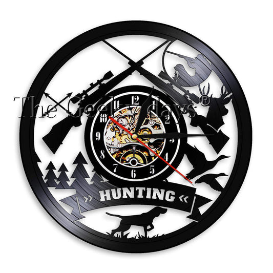 Decorative wall clock with hunting-themed design on a white background