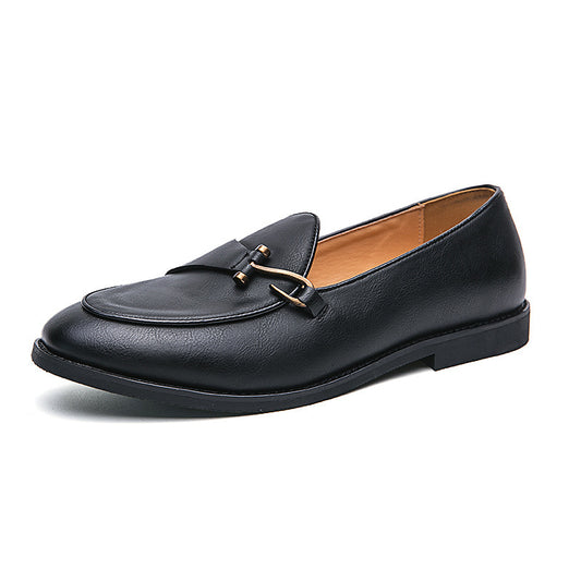 Black leather loafer shoe on a white background
