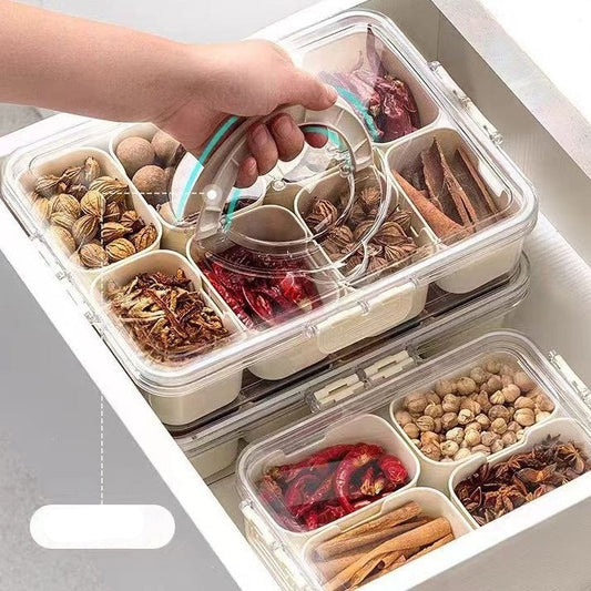 Spice container with compartments filled with various spices, held by a hand.