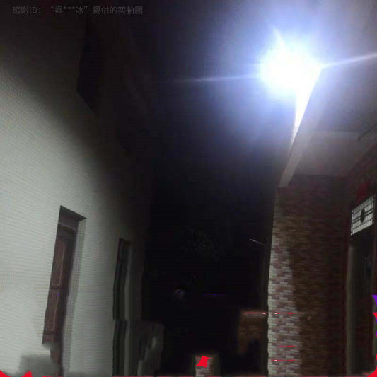 Dark alleyway with a bright light source at night