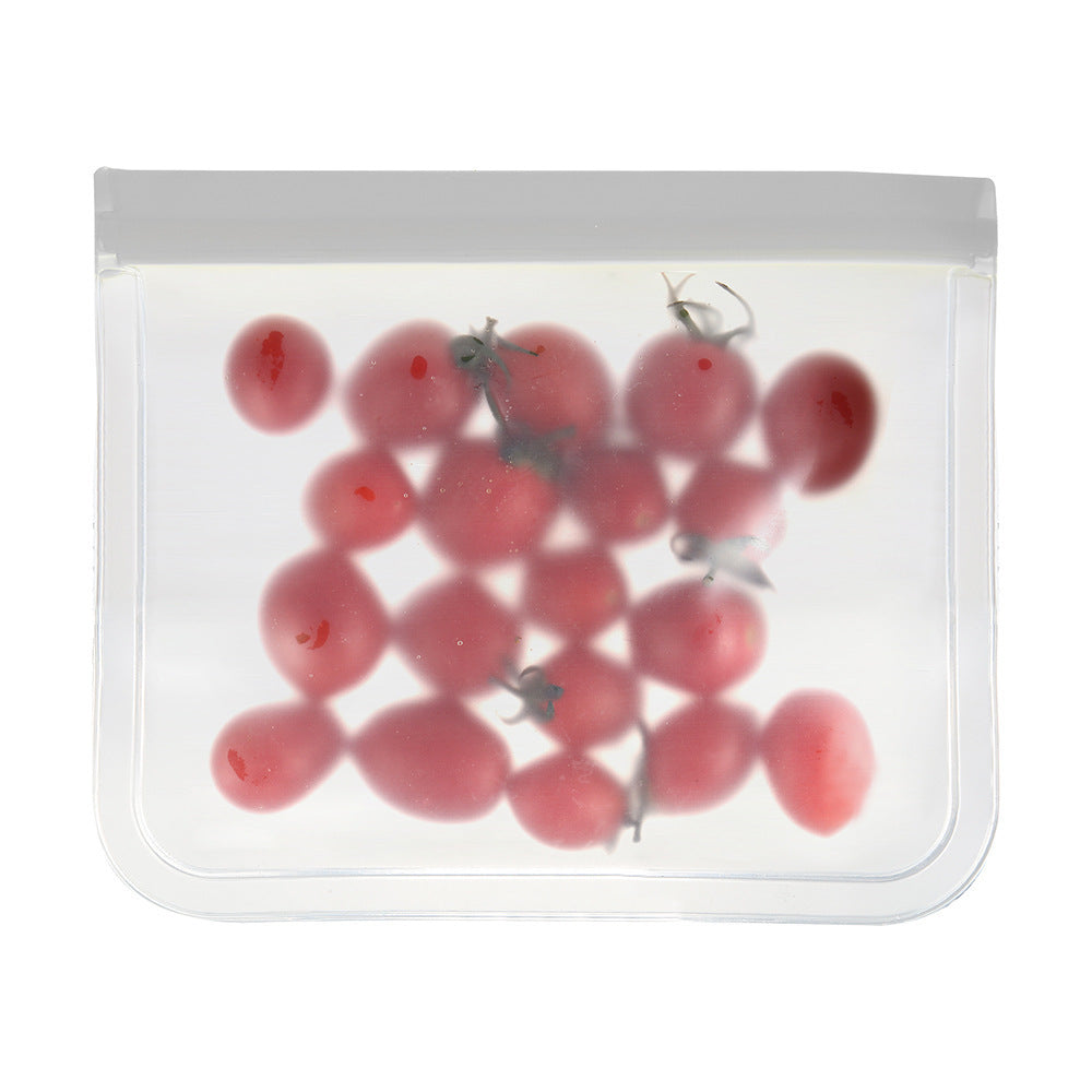 Clear plastic bag with red berries and a gray object inside on a white background