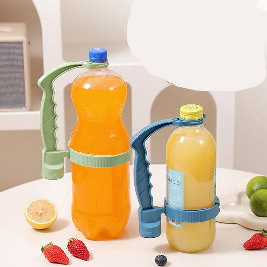 Beverage pouring handles with orange and yellow bottles on a table.
