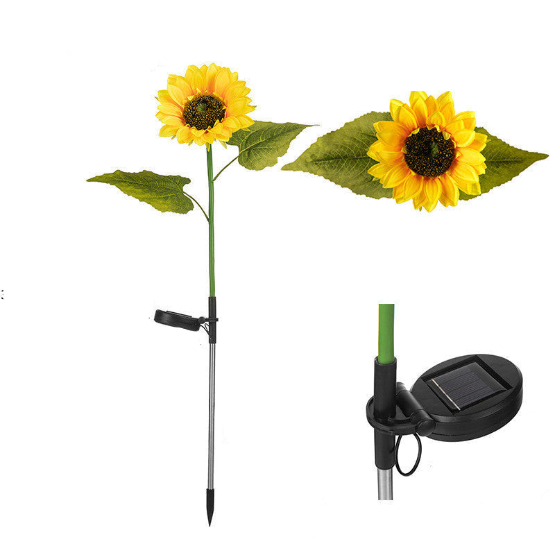 Measurement chart of a sunflower decoration with solar light, showing dimensions in inches and centimeters.
