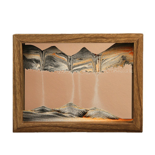 Framed artwork of a mountain landscape with a wooden frame