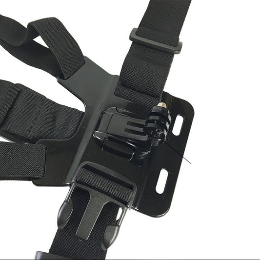 Black chest harness with J type base attachment on a white background