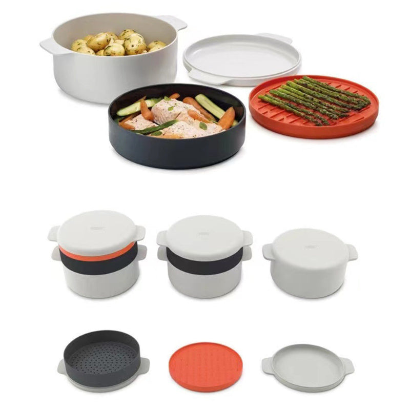 Set of kitchen cookware including pots, pans, and lids on a white background