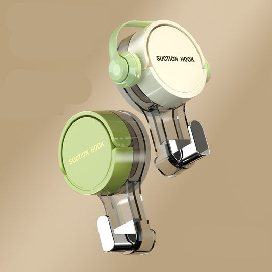 Suction cup hook with green and clear design on a beige background
