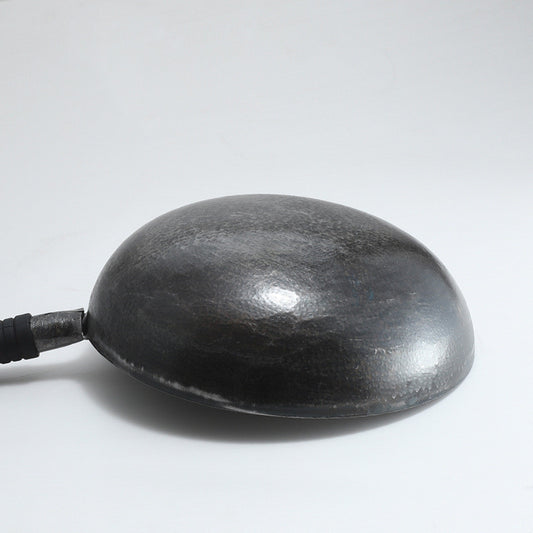 Black rubber floatation device on a white background