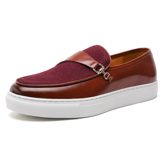 Maroon and brown loafer shoe with white sole on a white background