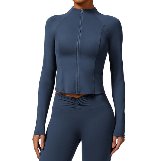 Blue athletic outfit with a long-sleeve top and leggings on a white background