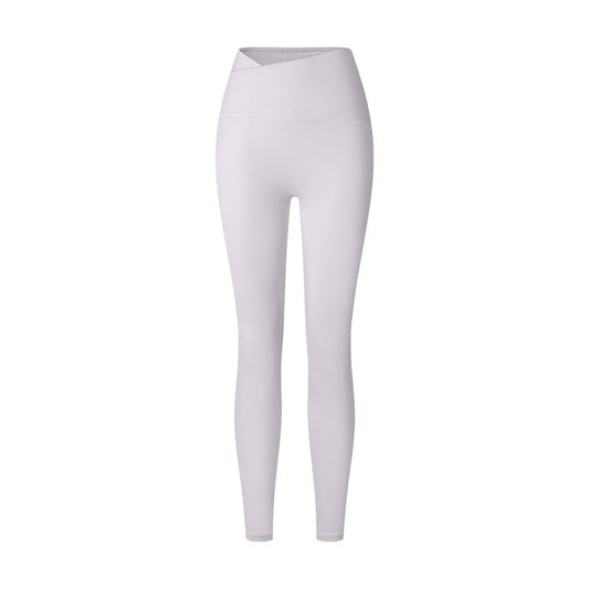 A pair of white, solid color sports trousers with a cross waist design, paired with white sneakers.
