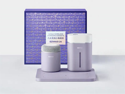 A set of purple-colored electronic devices including a charging base, humidifier, and Bluetooth speaker, presented with its packaging box.