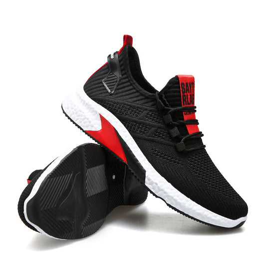 Black and red athletic shoes on a white background