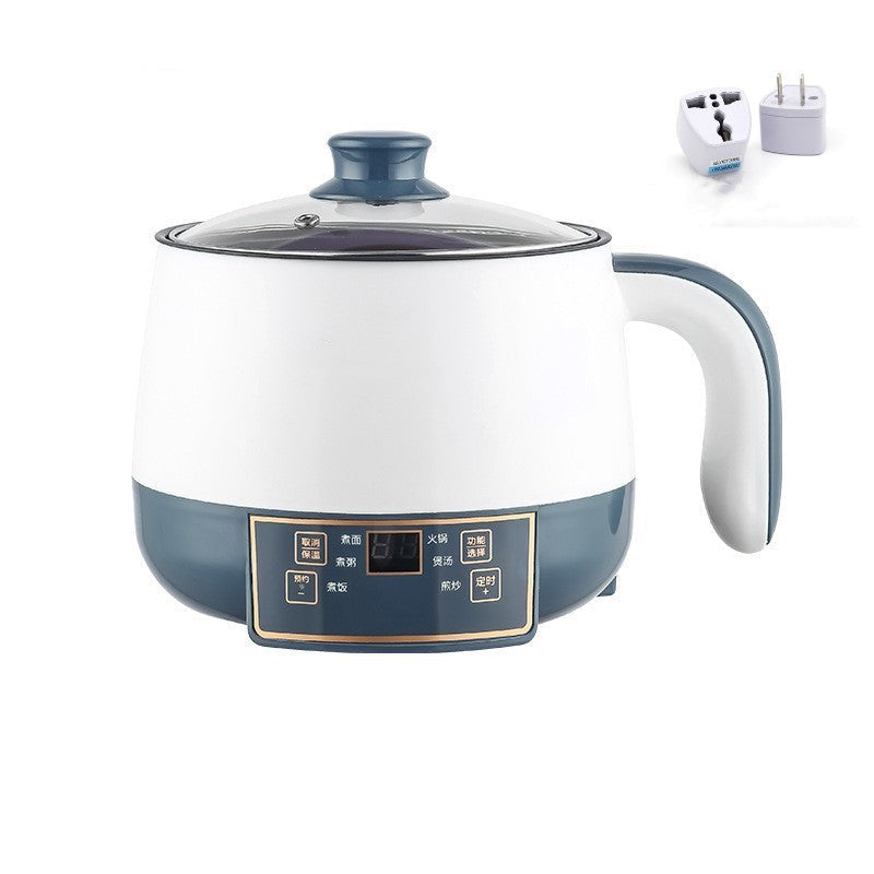 A multifunctional electric cooking pot placed on a table, with a person's hand holding a spoon above it. The pot is primarily white with a blue lower section, and has a digital control panel at the front.