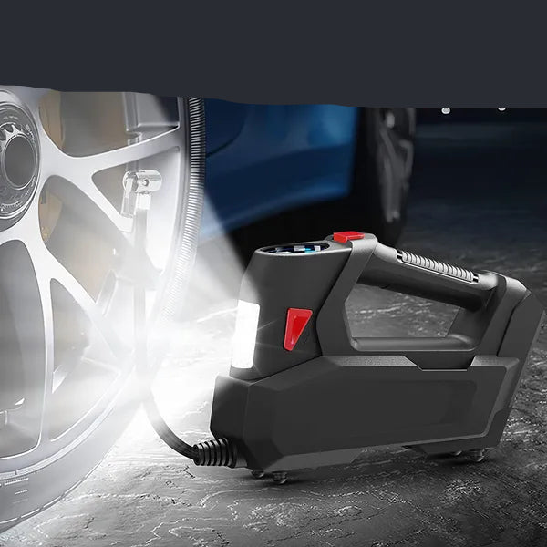Car tire inflator with LED lighting for night time use, shown near a car tire.