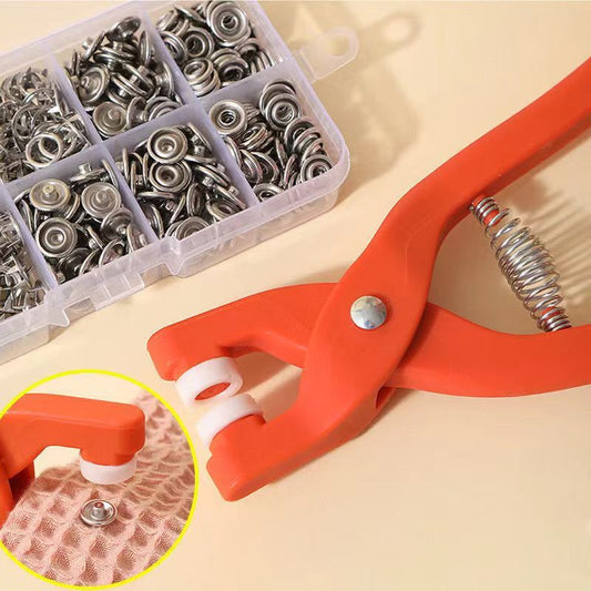 Orange press stud tool with a close-up inset on a beige background, surrounded by metal press studs in a clear container.