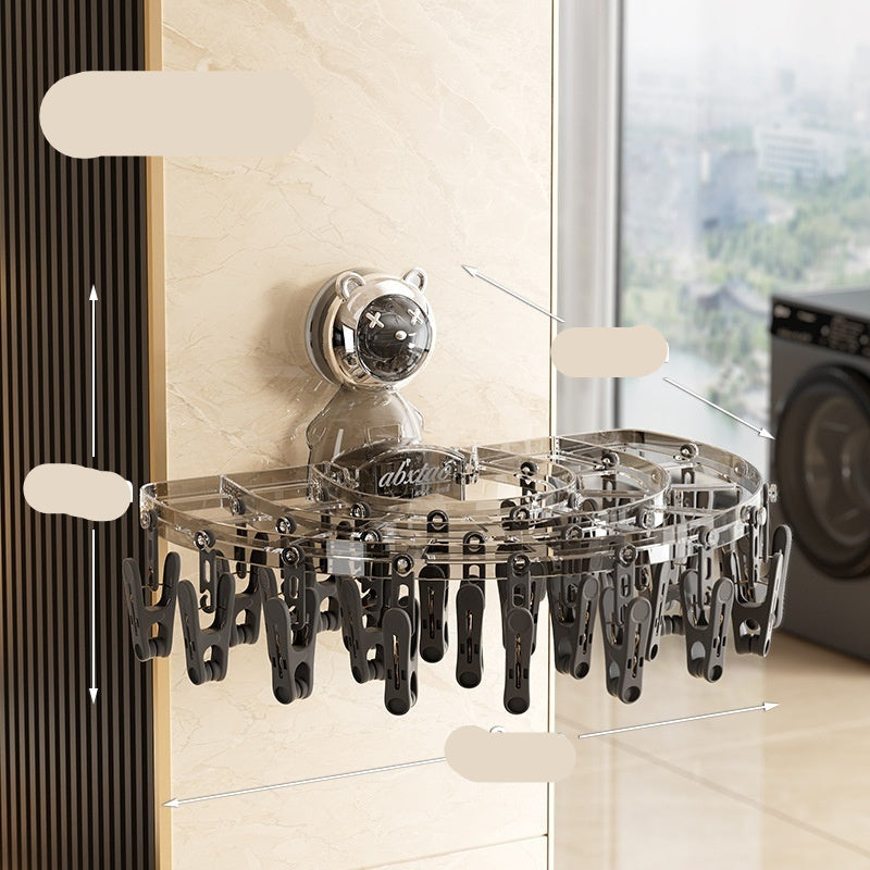 Transparent gray clothes rack with dimensions labeled, mounted on a wall.
