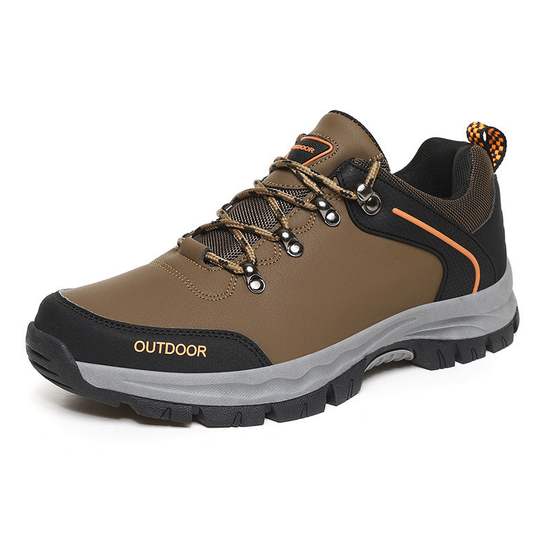 Brown outdoor shoe with black and gray accents on a white background
