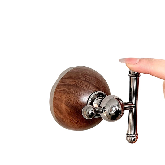 Wooden door handle with metal lever on a white background