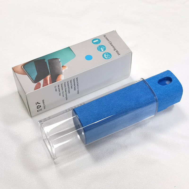 Blue spray bottle with packaging on a white background