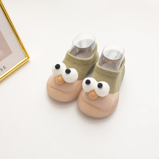 Pair of baby owl-themed socks on a white background