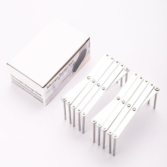 Set of telescopic storage racks with packaging on a white background