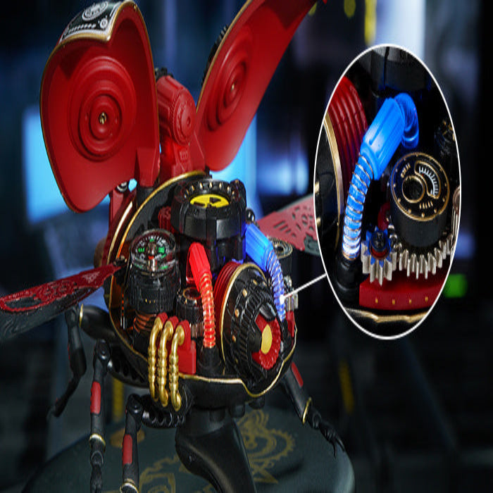 Close-up of a red mechanical object with intricate details on a dark background