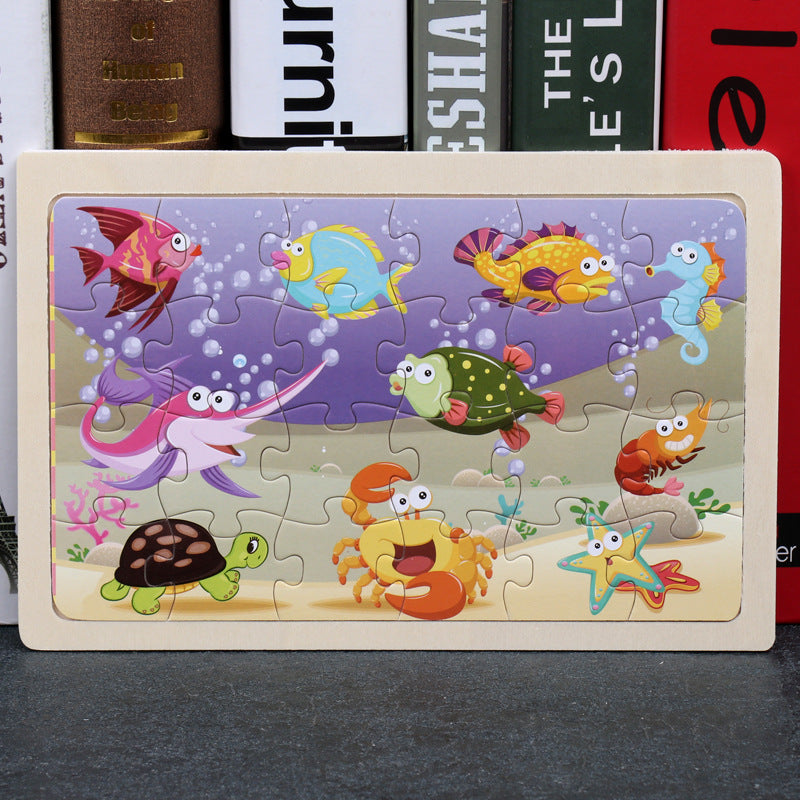 Children's puzzle with sea-themed design featuring colorful fish and sea creatures on a wooden base.
