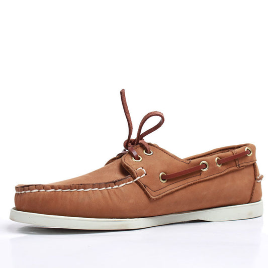 Brown leather boat shoe on a white background