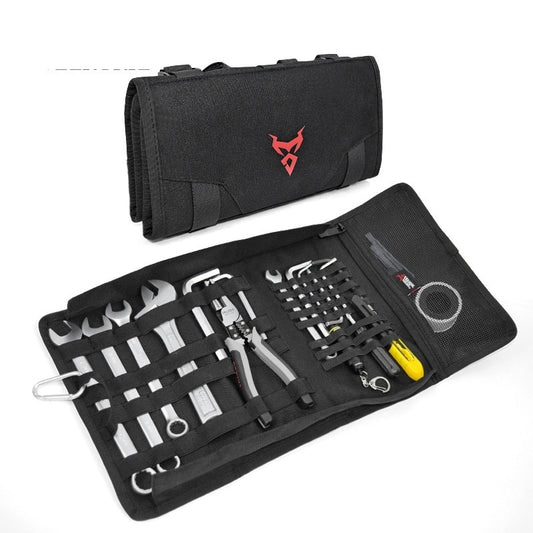Black tool roll with various tools on a white background