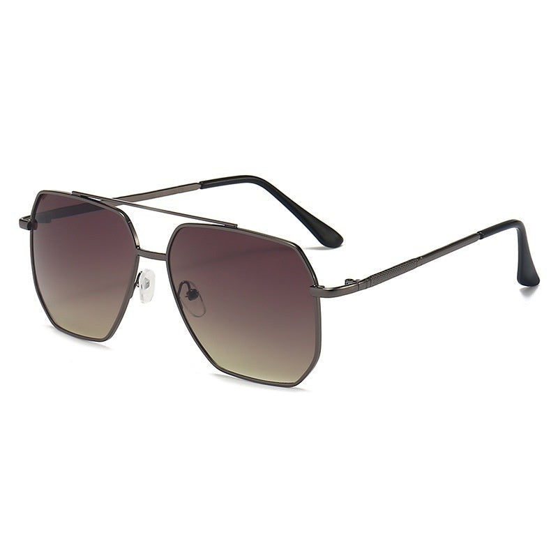 A pair of aviator style sunglasses with a double beam design, featuring dark lenses and a metallic frame.