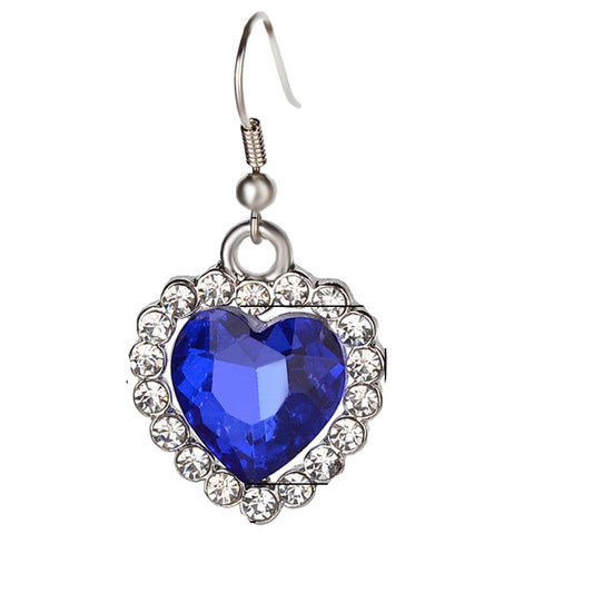 Earrings with blue heart-shaped gemstone and measurements on a white background.