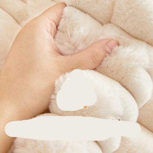 Hand holding fluffy white material with temperature scale indicating warmth and heat.
