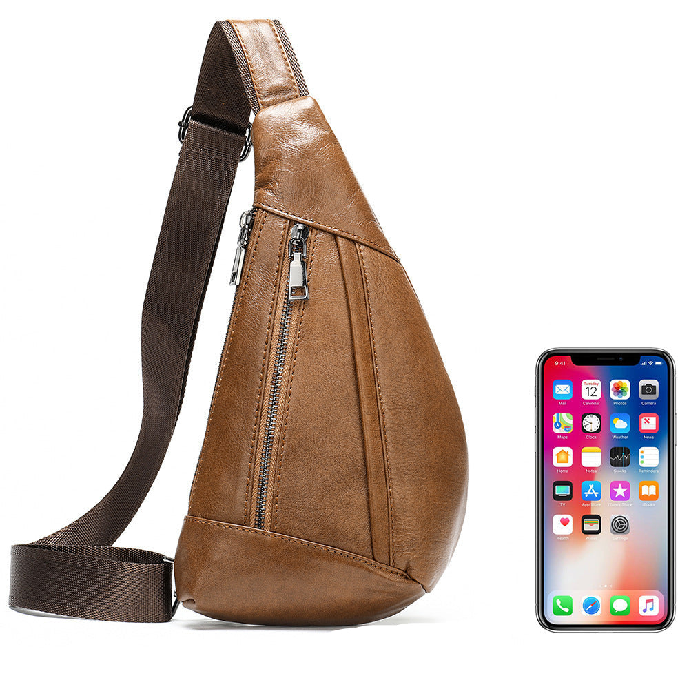 Brown leather sling bag with dimensions and an iPhone for scale on a white background
