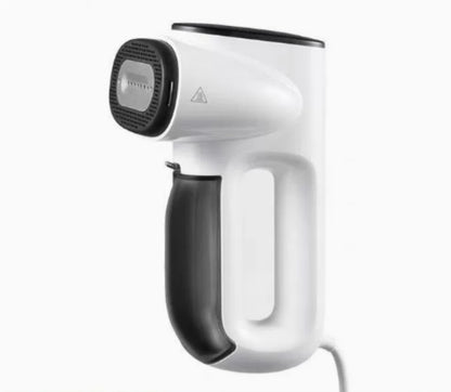 White handheld hair dryer with black handle on a white background