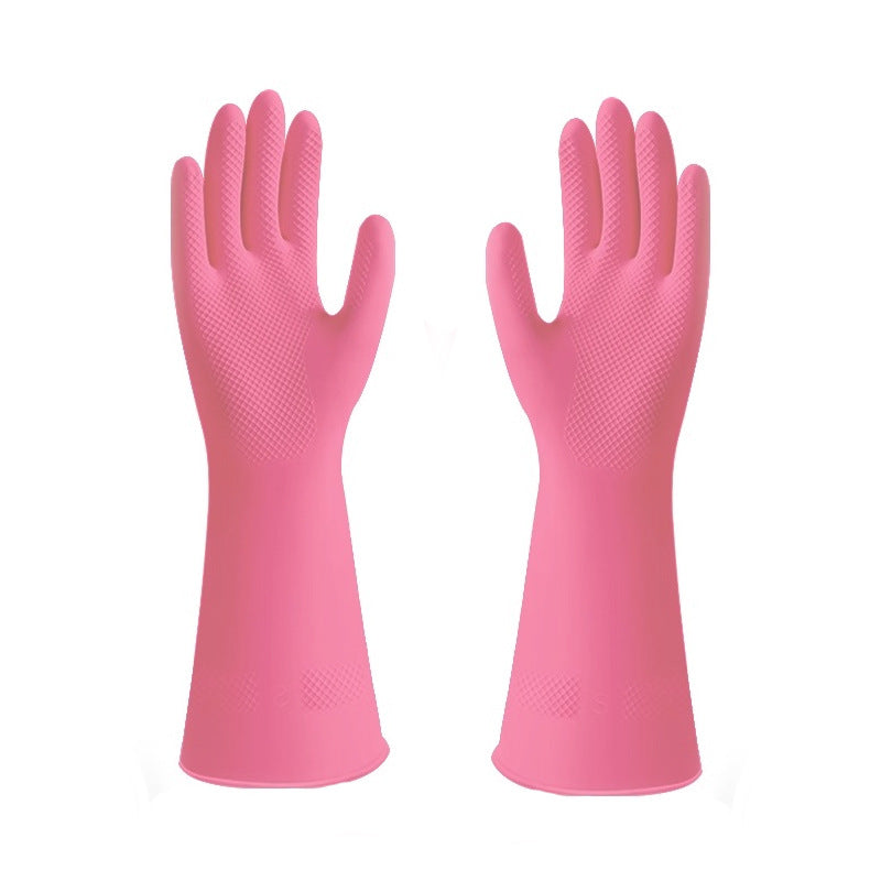 Pair of pink rubber gloves on a white background