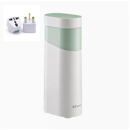 White and green electronic device with UK plug adapter on a white background