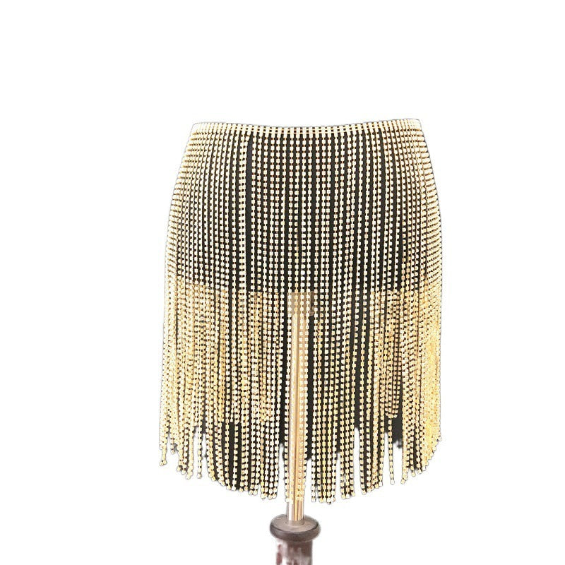 A close-up image of a waist chain skirt with rhinestone embellishments. The chain features a metallic gold finish and is designed to be worn around the waist.