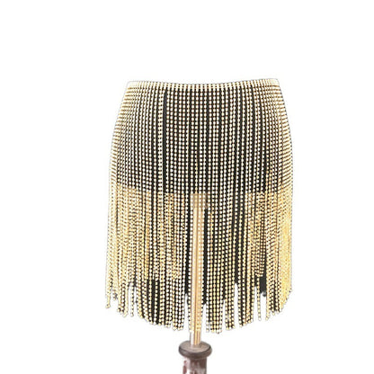 A close-up image of a waist chain skirt with rhinestone embellishments. The chain features a metallic gold finish and is designed to be worn around the waist.