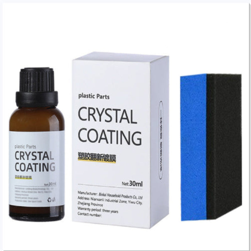Crystal coating kit with bottle, box, and sponges on a white background