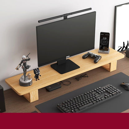 Monitor stand made of black walnut wood, with a computer monitor, keyboard, and various desk accessories on it, placed on a wooden floor against a white background.