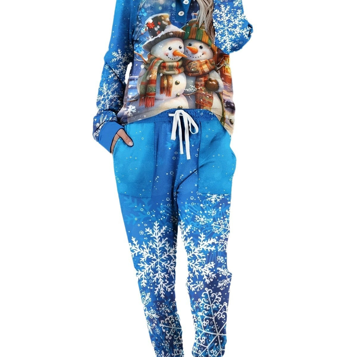Blue Christmas-themed hoodie and pants with snowmen and snowflakes on a white background