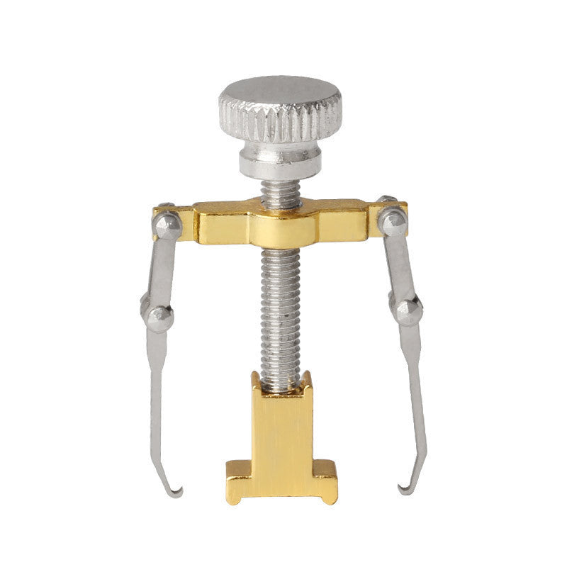 Metal tool with a spring mechanism on a white background