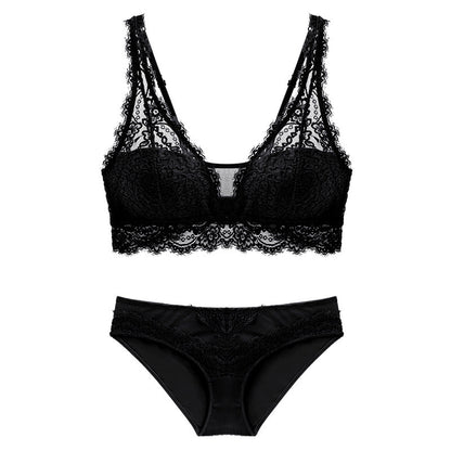 Black lace bra and panties set on a white background