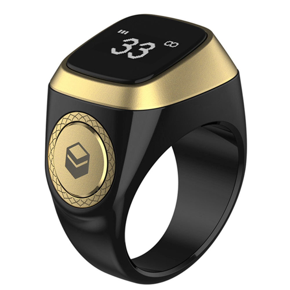 Black and gold smart ring with digital display on a white background
