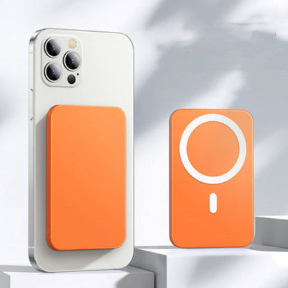 Orange magnetic phone case attached to a smartphone on a light background