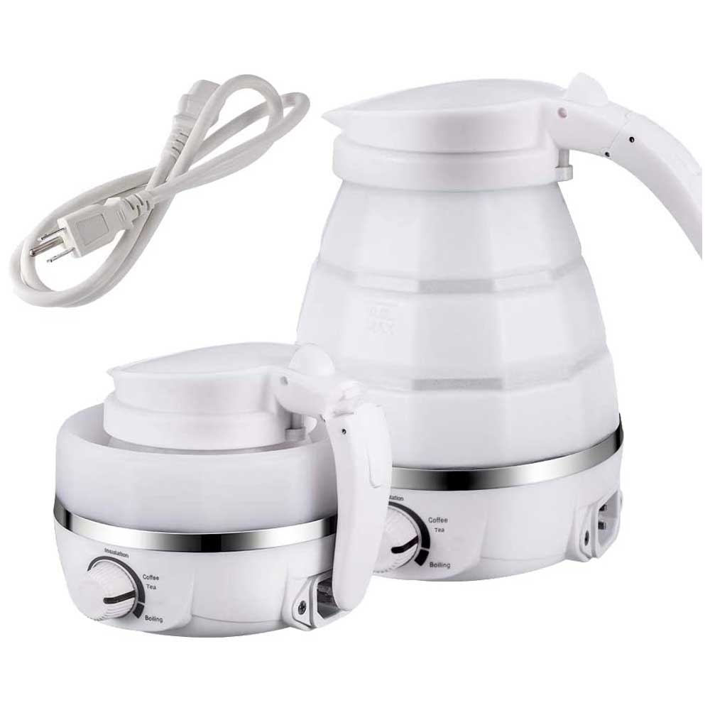 White electric kettle with a power cord on a white background