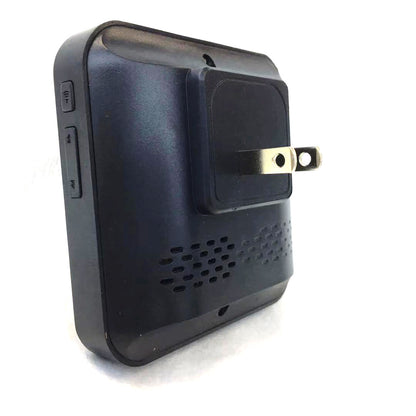 Black electronic device with a plug on a white background